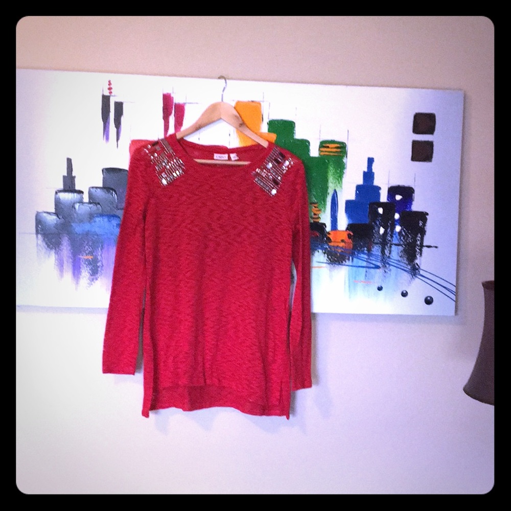 Red sweater. Nice condition.